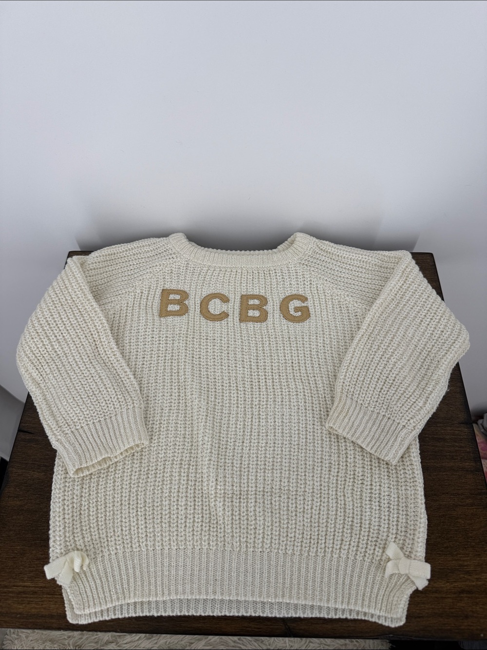 BCBG Ivory Knit Crewneck Sweater with Tan Logo and bows 3T